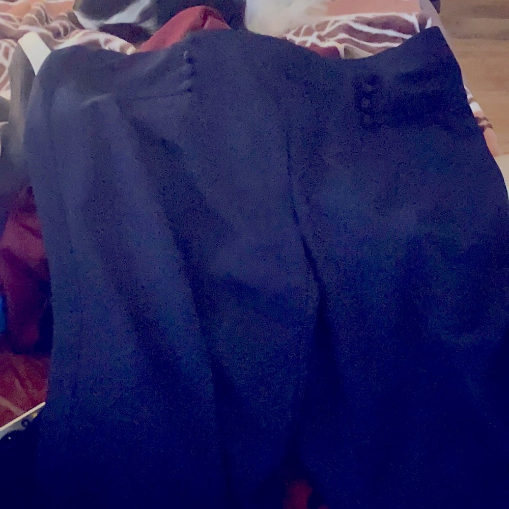 Slick business trousers.  Snug fit with control-top.  Brand is NY clothing co.